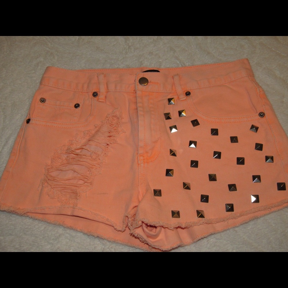 Neon orange jean shorts